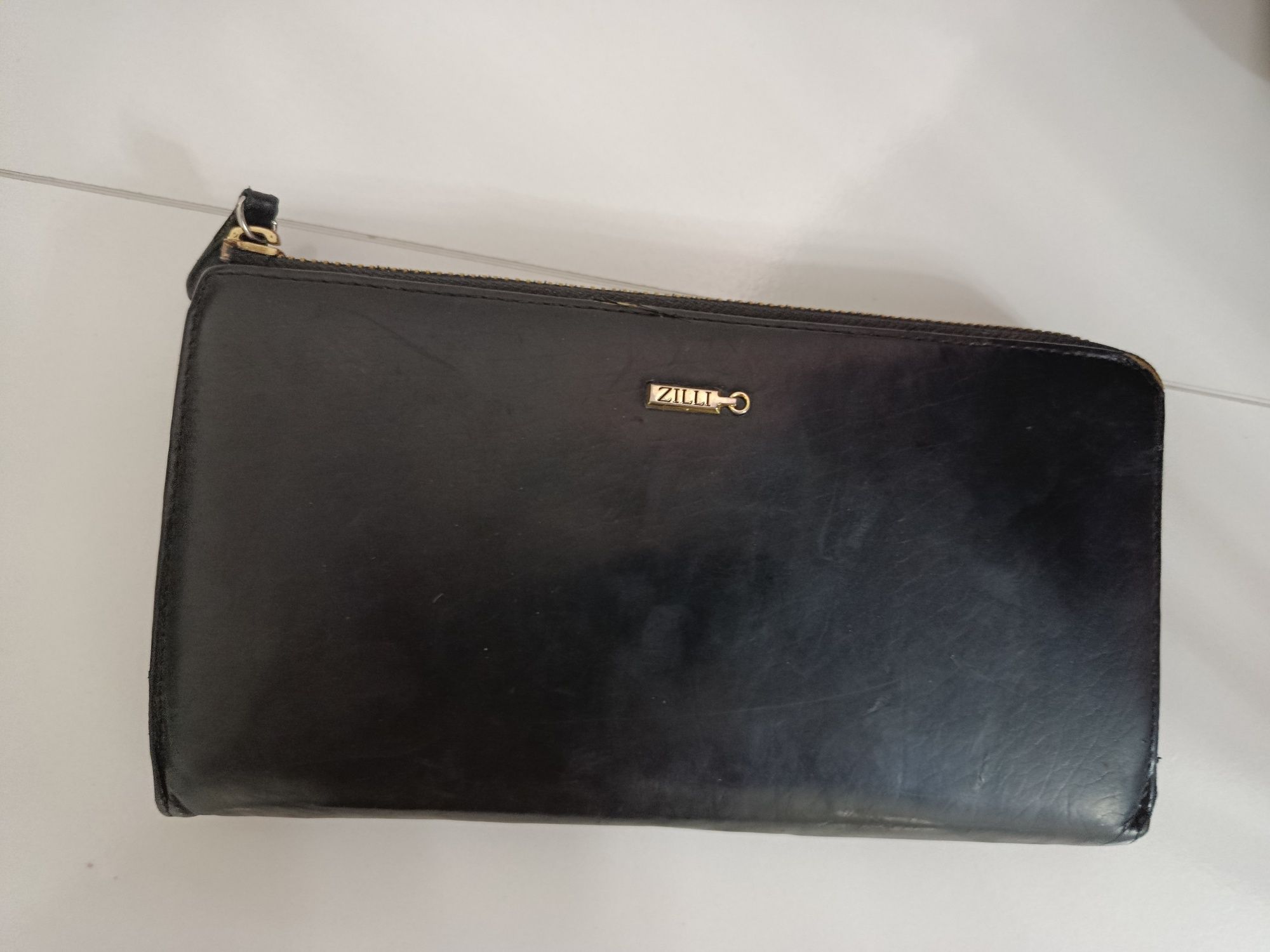 Кошелек Zilli original брали 3 года назад,за 2500 США