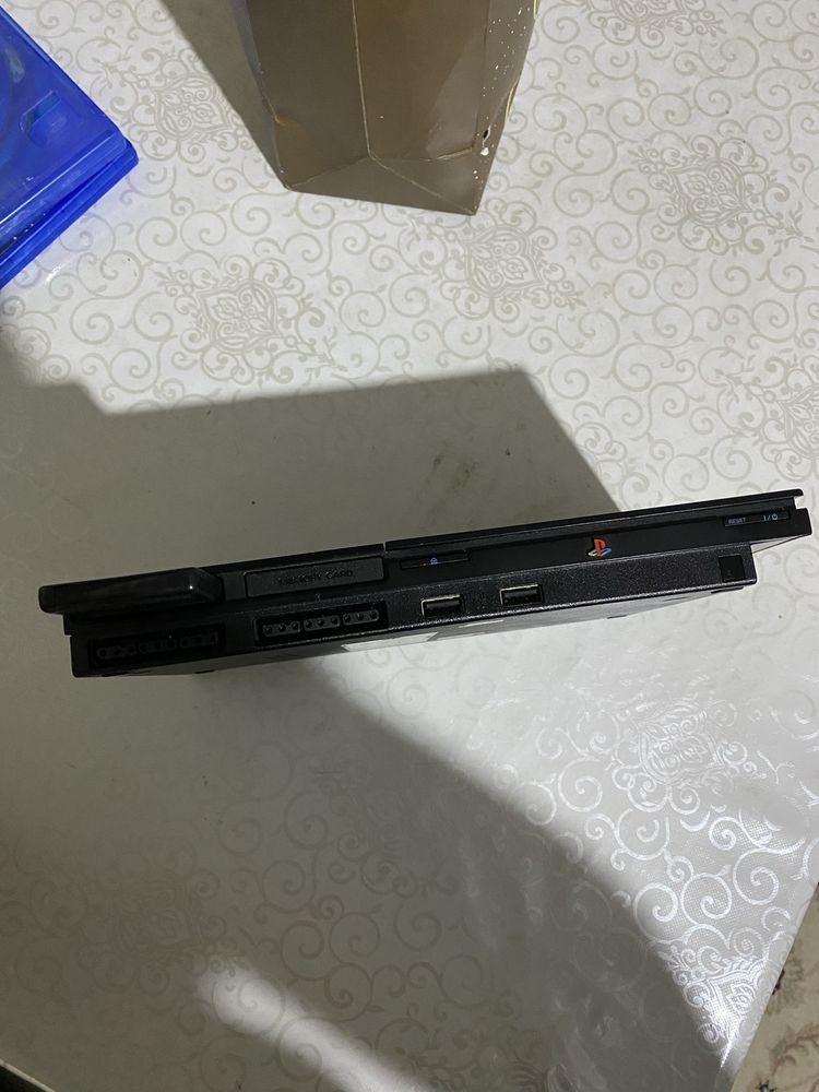 Продам пс2 с играми или же обмен на айфон 7