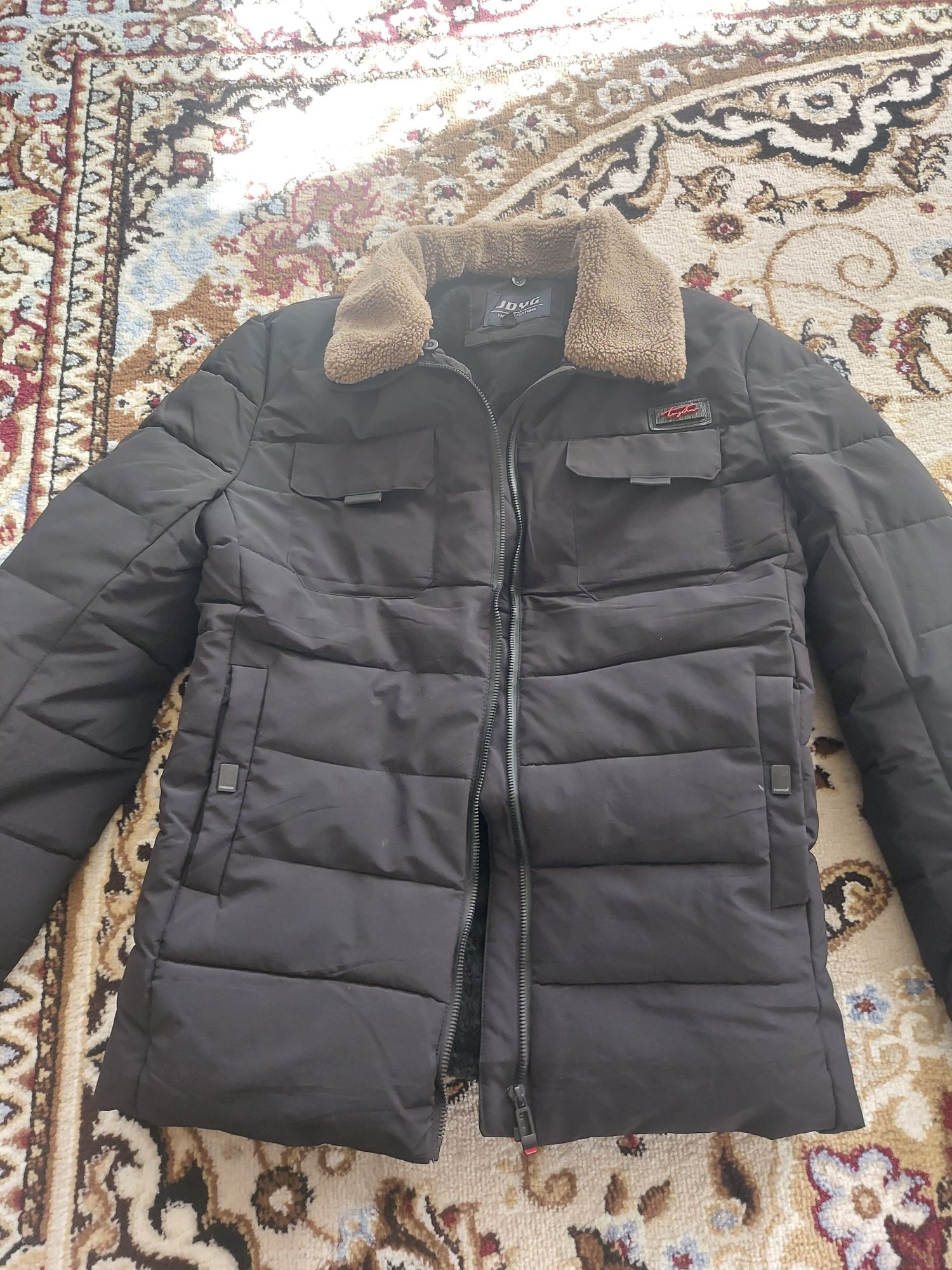 Продам куртку теплую