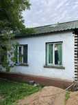 Продам участок с домом по центральной улице 7 соток
