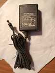 Продам адаптер питания   12V--1A.