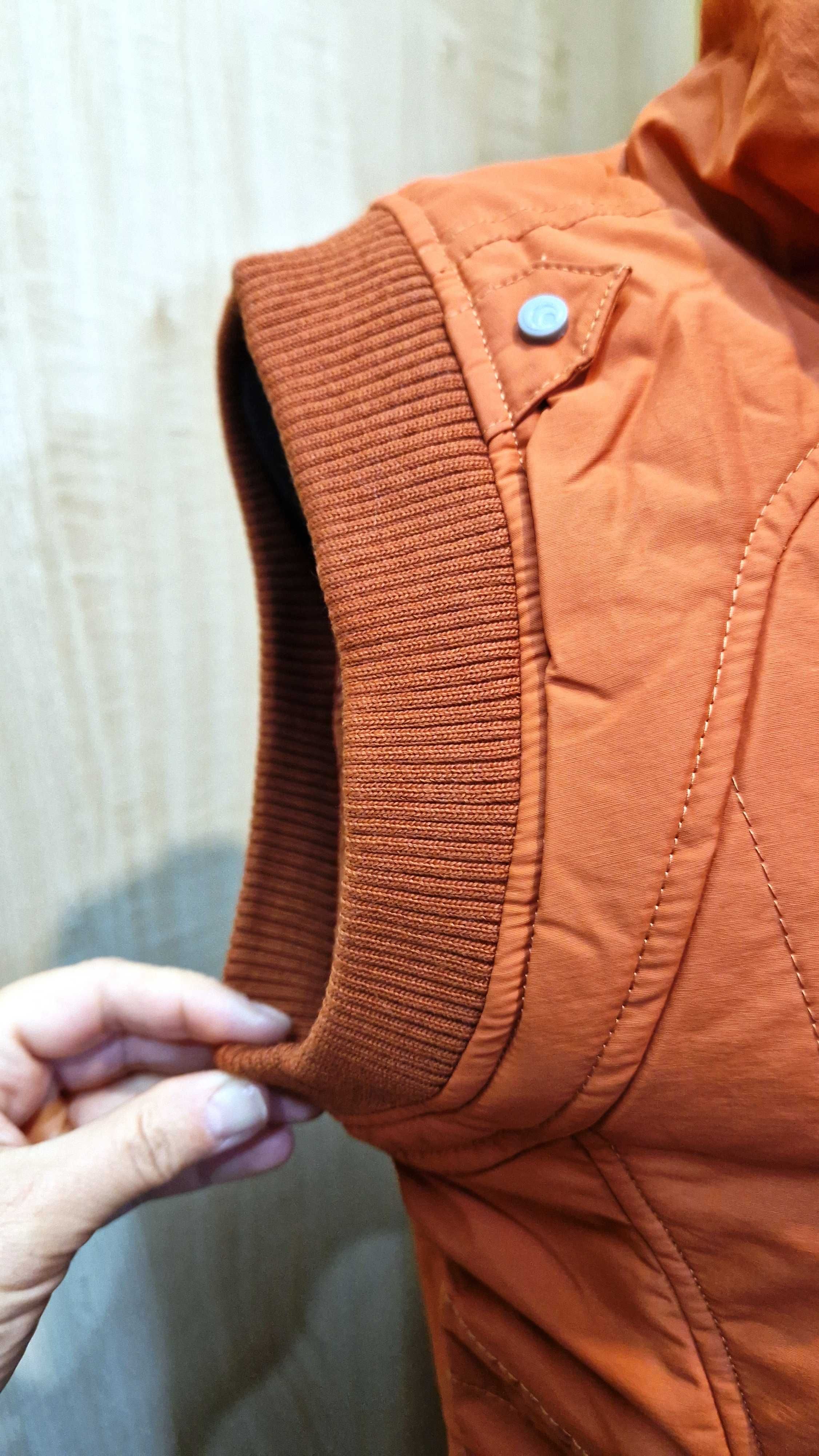 Продам новый женский фирменный жилет Outventure