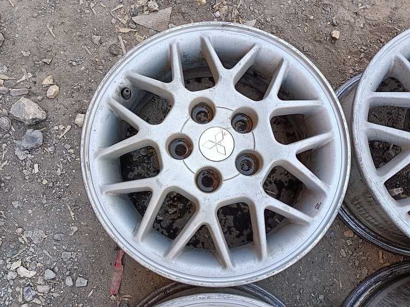 Продам оригинальные легкосплавные диски на автомашину Mitsubishi