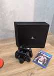 PlayStation 4 Pro 1TB + UFC 4 •