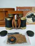 Бинокль фирмы "Binoculars" хорошего качества.