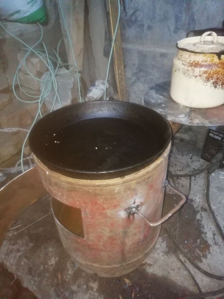 Очаг сделан из из маленького газ балона