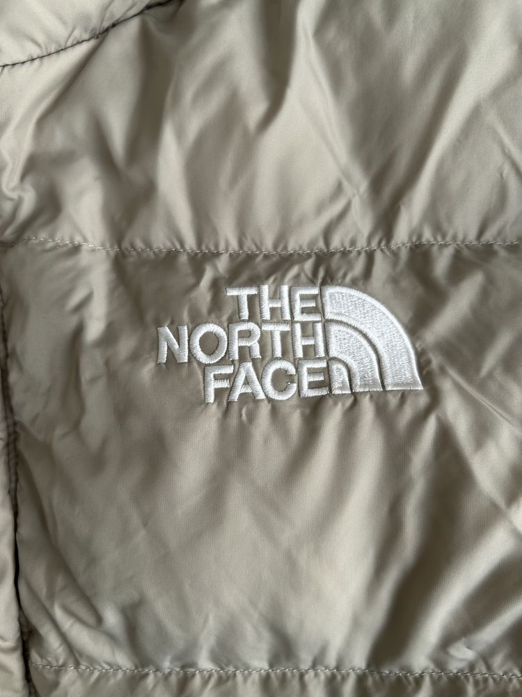 Продам женскую куртку the north face