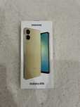 продам новый запечатанный Samsung A06 и беспроводные наушники Baseus05