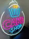 Неоновая вывеска "Cake Shop"