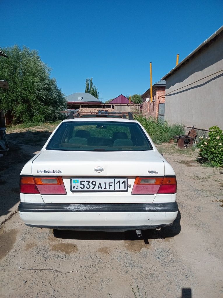 Автомобиль Нисан прнмерп