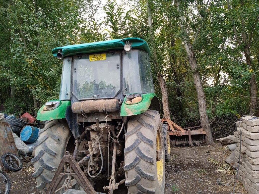 Трактор John Deere 824
