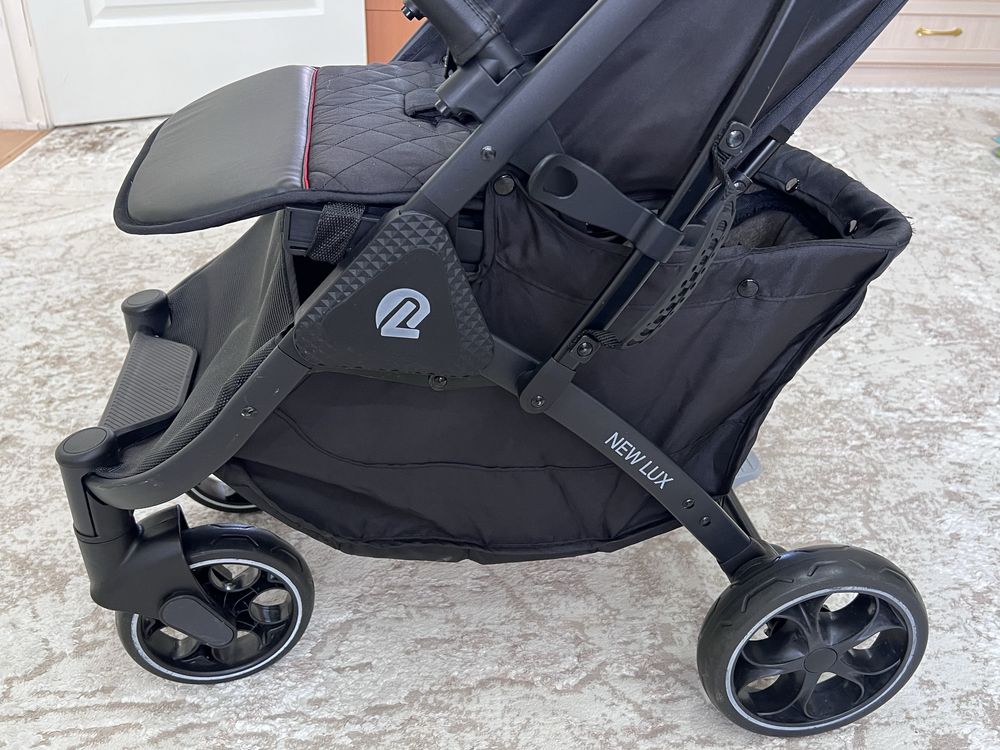 Продам прогулочную коляску New Lux