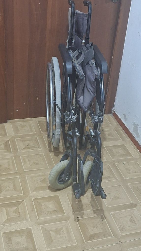 Инвалидная коляска
