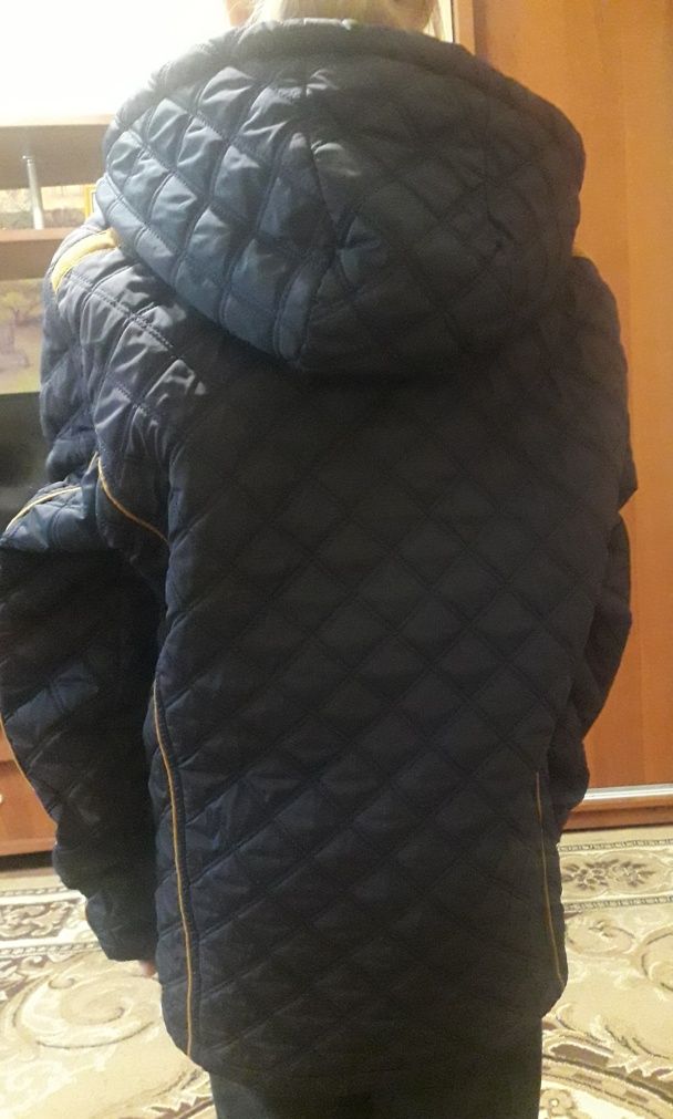 Куртка на 12-14 лет.