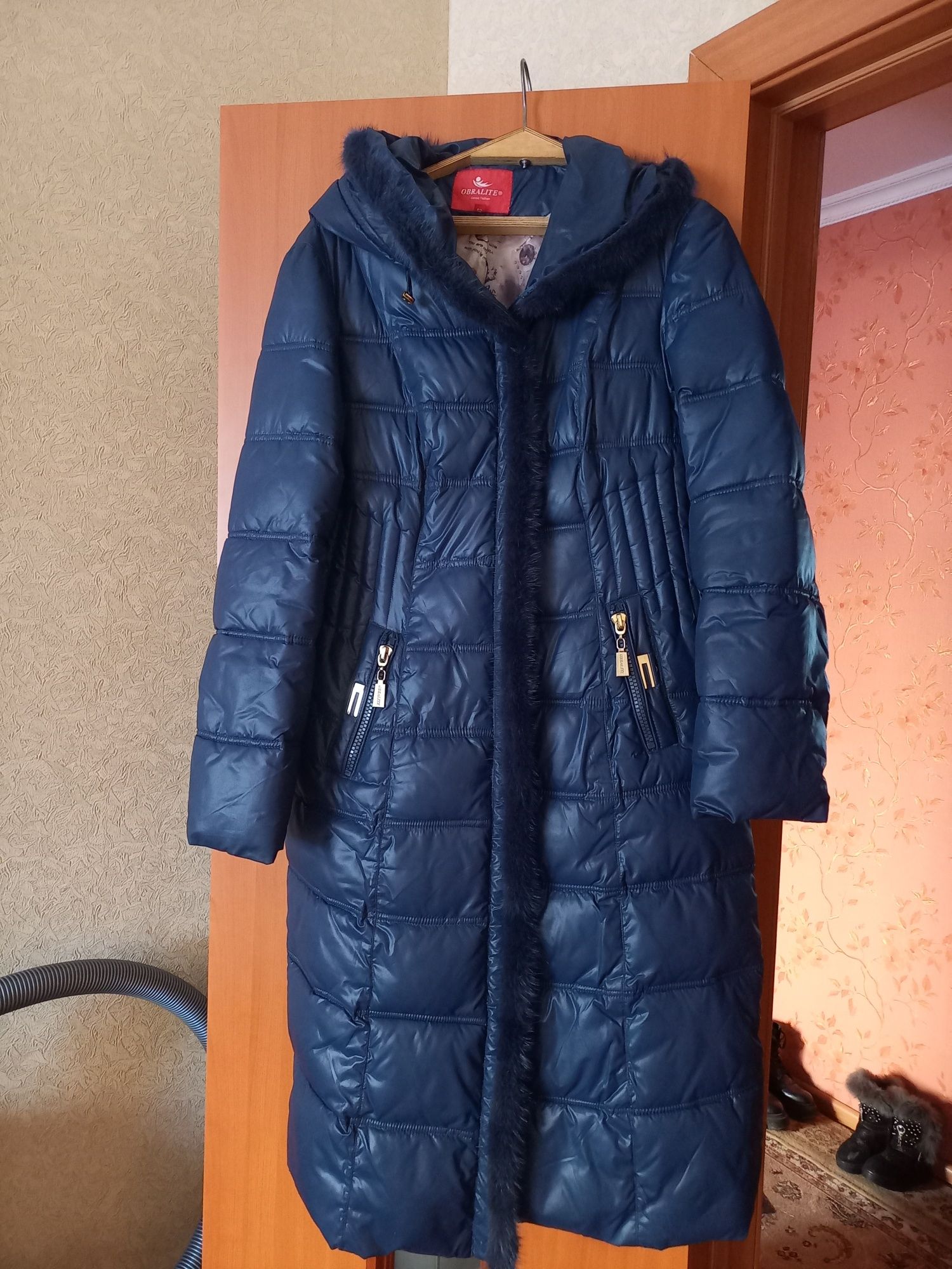 Продам женский пуховик