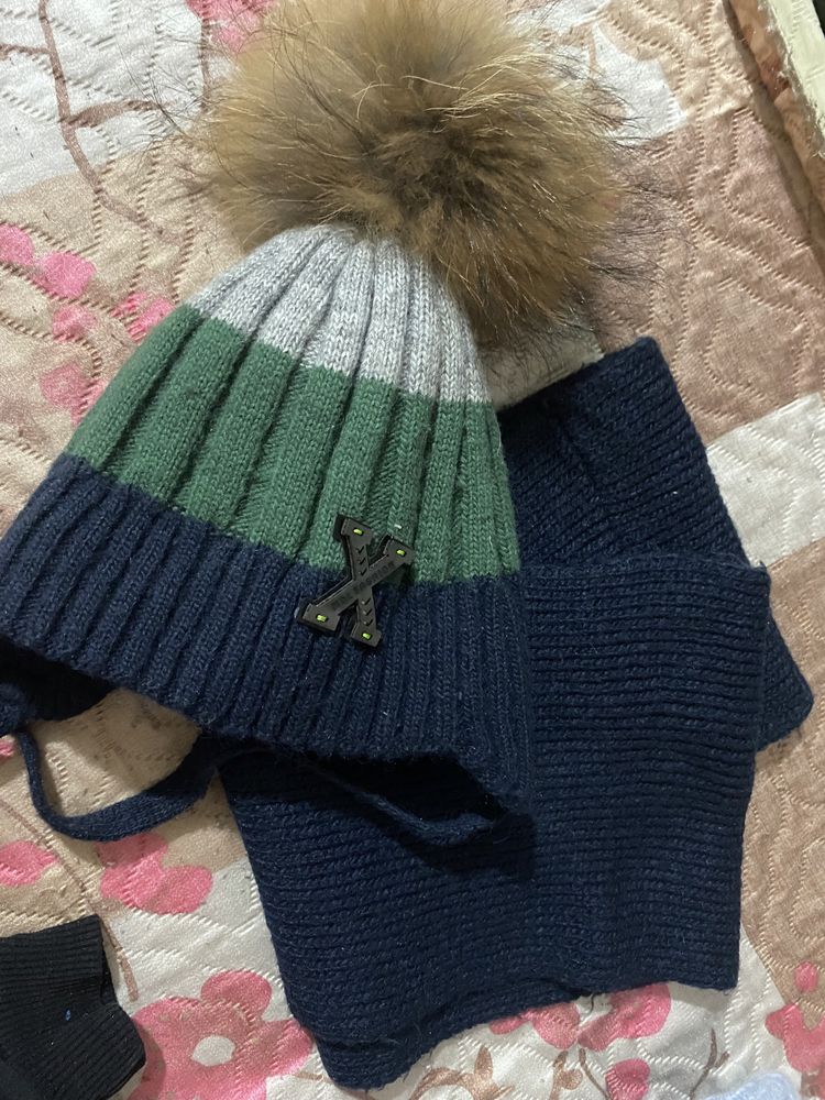 Продам зимнюю шапку на 3-5л.