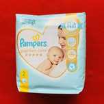 Подгузники и трусики Pampers premium care original в упаковке