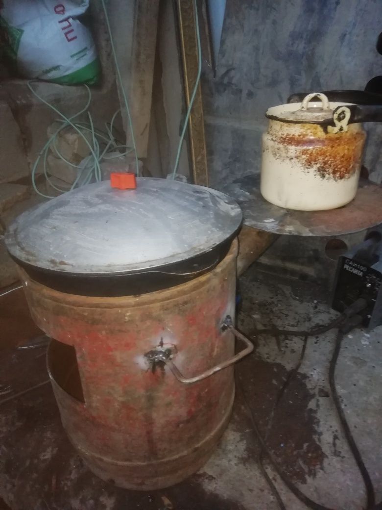 Очаг сделан из из маленького газ балона