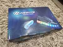 Продаю кроссовки heelys