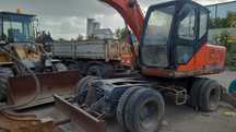 Продам экскаватор колесный 2011 год, Hengte HTL120, Китай
