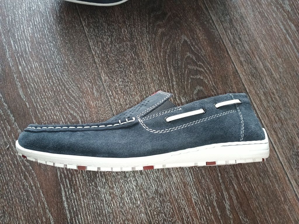 Продам новые мокасины фирмы Rieker .43 размер.