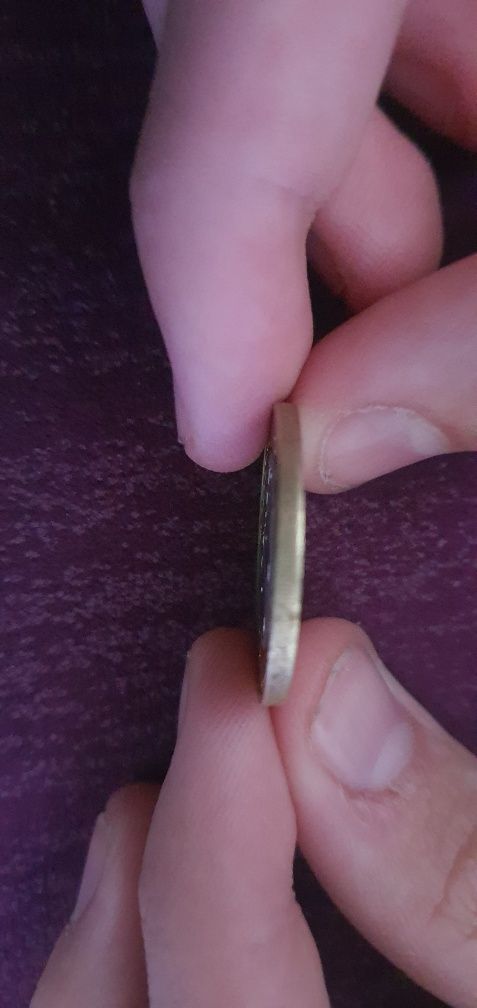 Сто тенге из стали