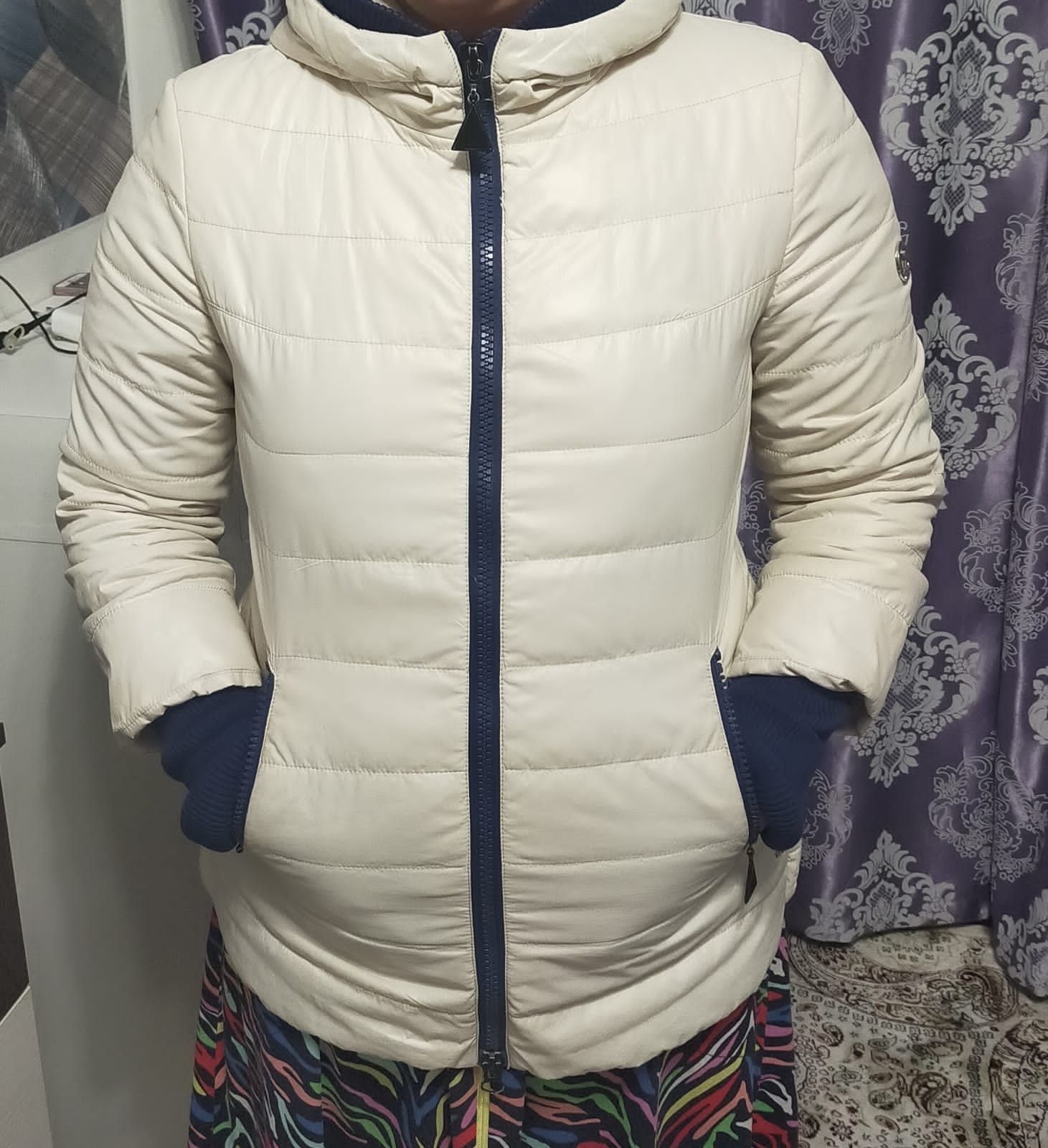 Продам зимнию  куртку новый
