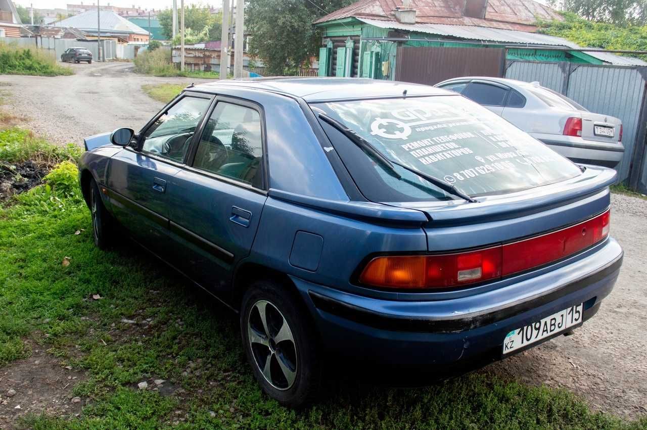 Mazda 323F BG обменяю более новое авто +500 -600тысяч моя доплата