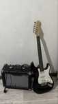Электрогитара от бренда “Fender Stratocaster”