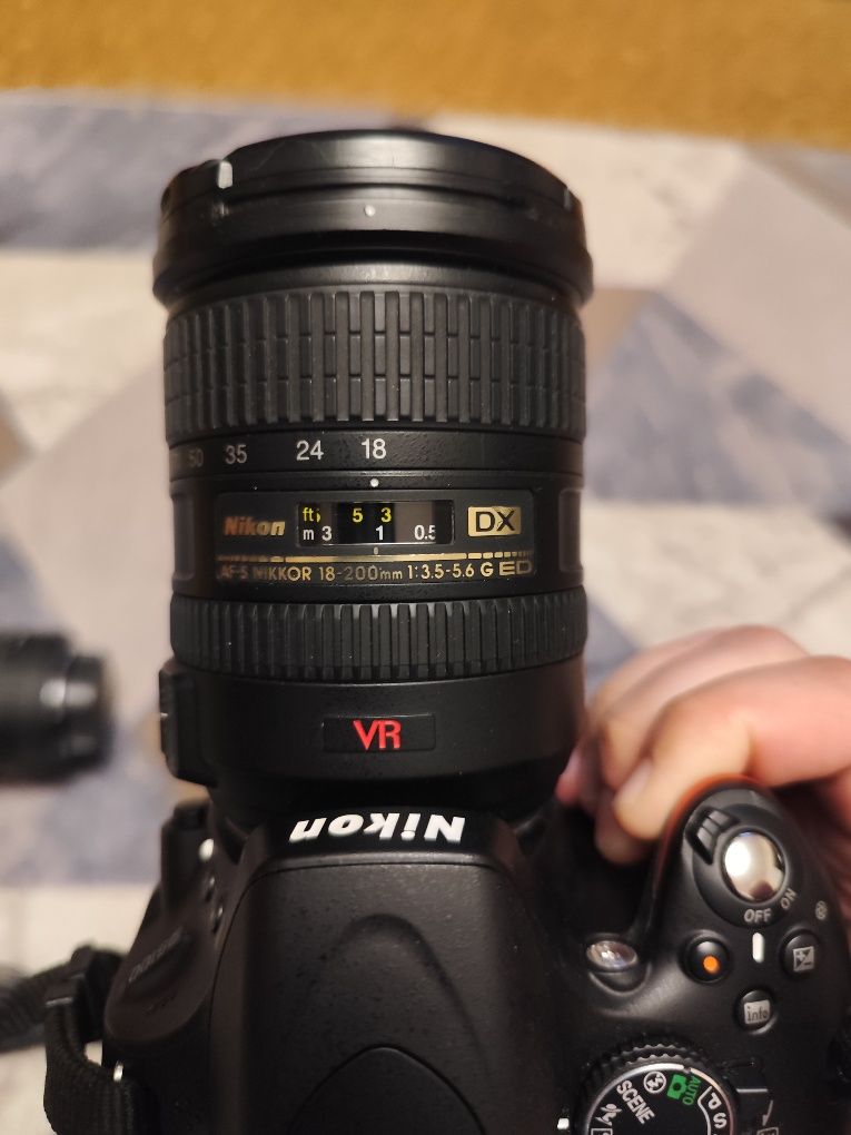 Продаю комплект Nikon D5100 с тремя объективами, вспышкой и аксессу