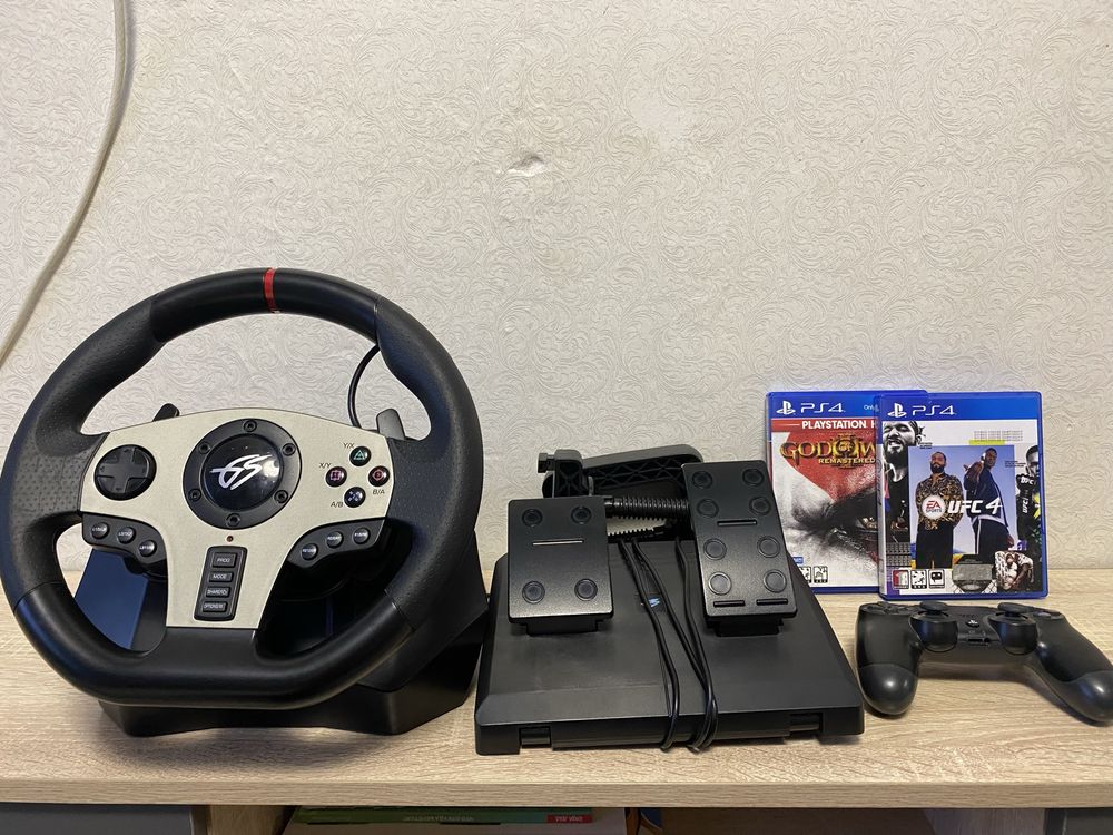 Руль,педали,джостик и 2 игры на Ps.