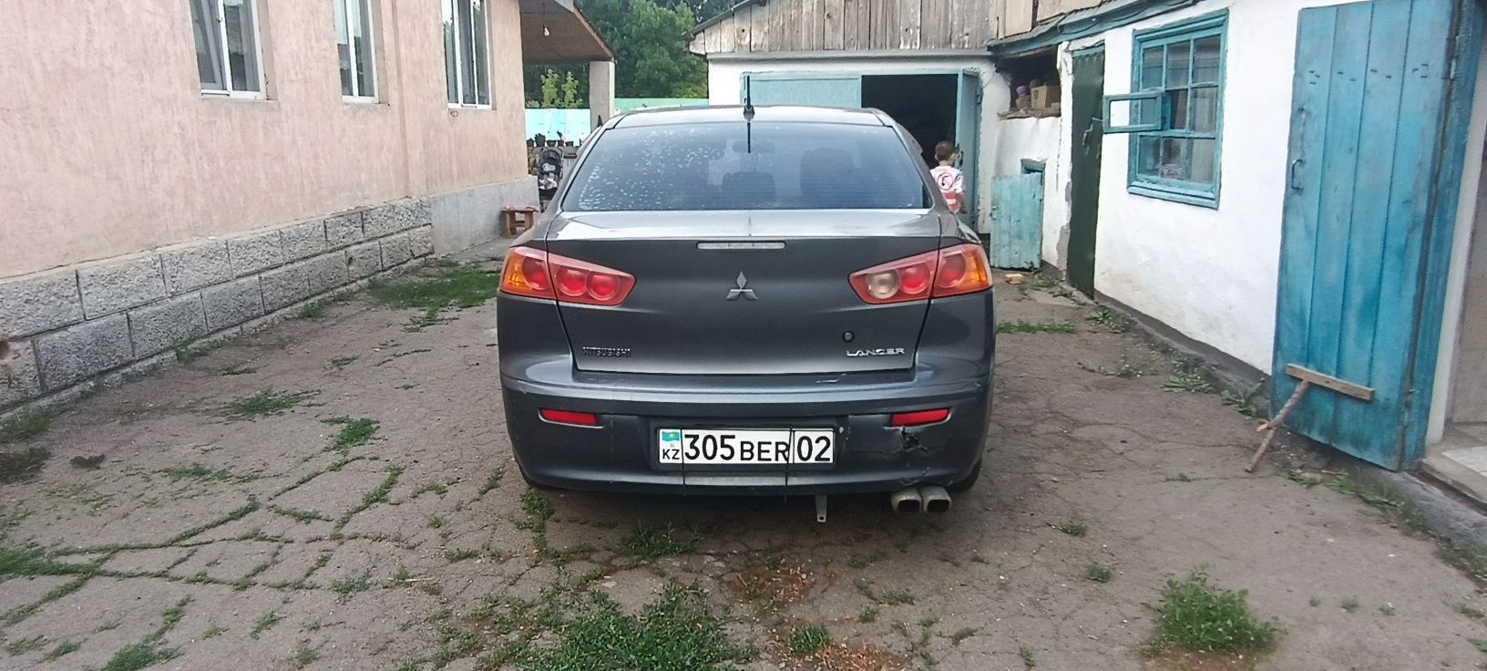 Митсубиси Лансер Х