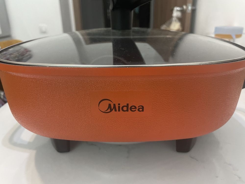 Новый электроказан  фирмы Midea
