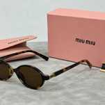 Солнцезащитные очки  Miu Miu (Миу Миу) с блестками.