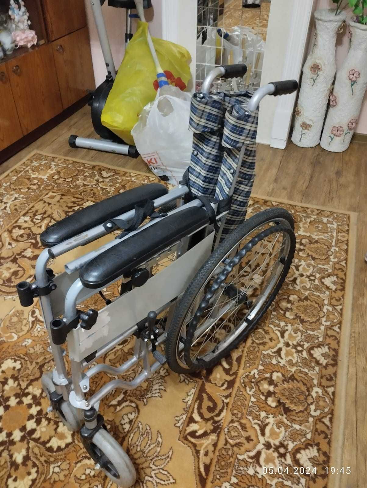 Инвалидная коляска