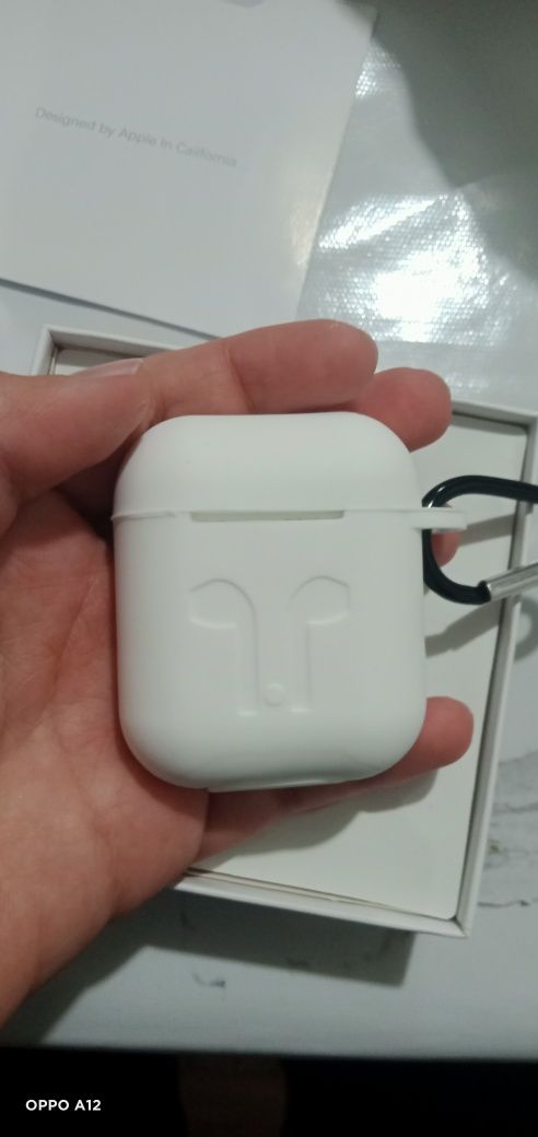 Apple AirPods, безпроводные наушники.