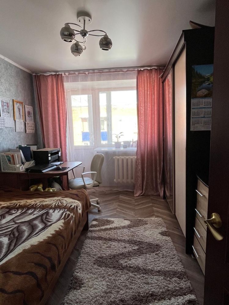 Продам 4 комнатную квартиру