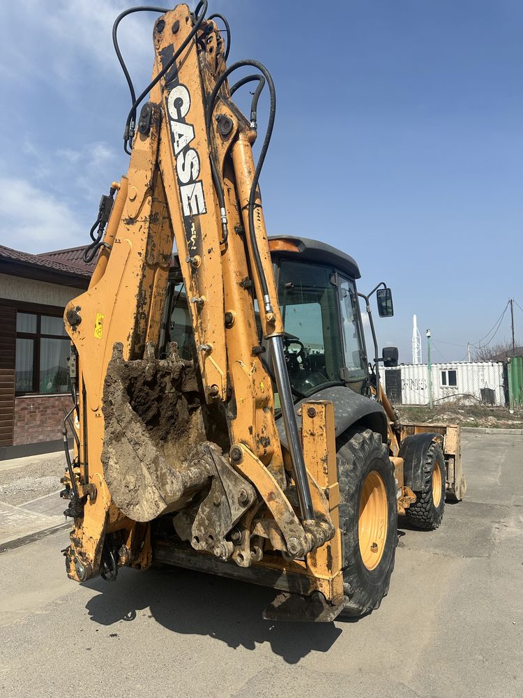 экскаватор погрузчик, 3 в 1