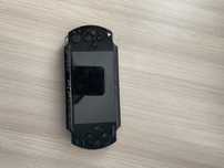 Продам psp игравую приставку