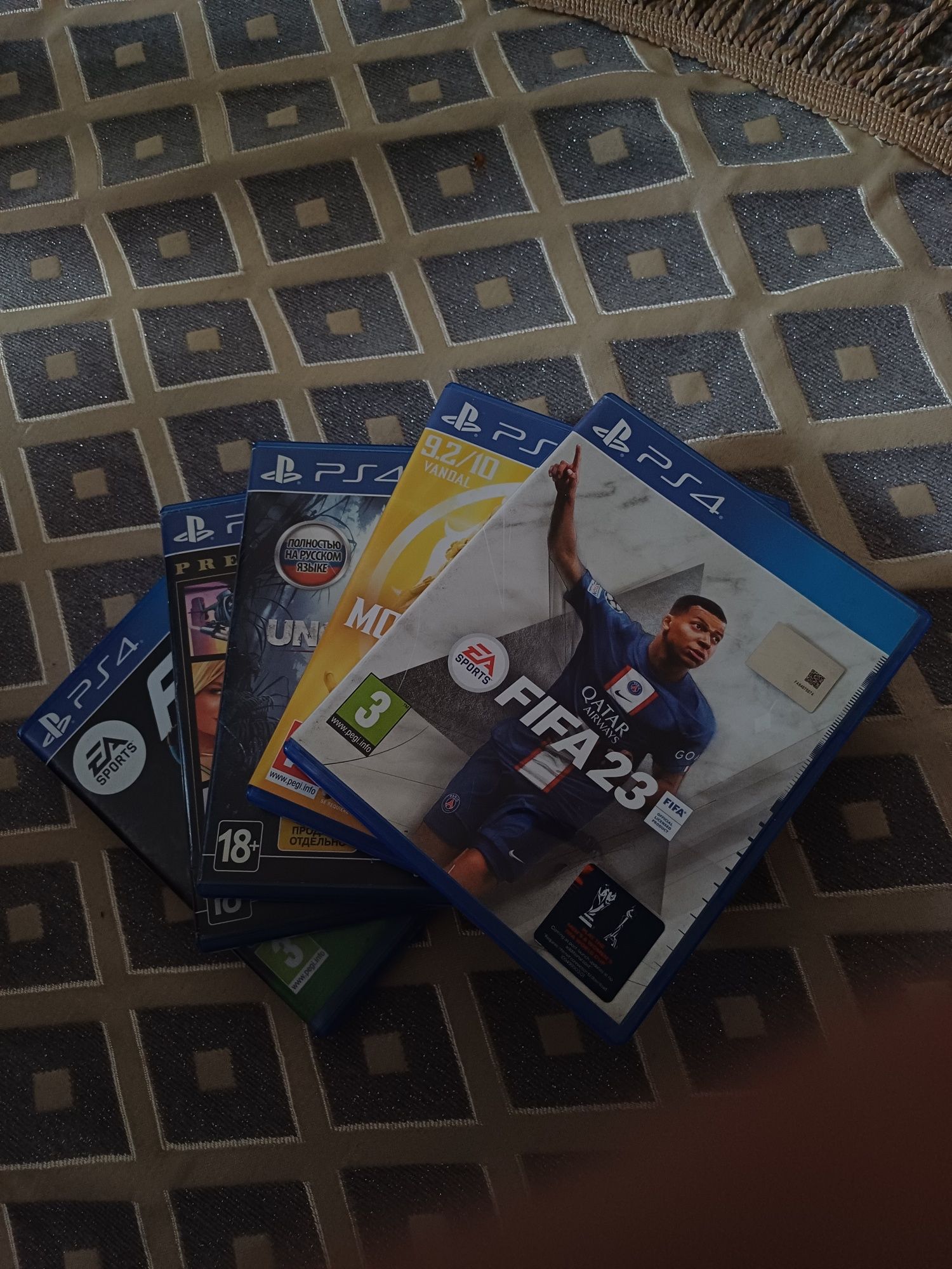 "PS4 500GB с играми FIFA 23, Mortal Kombat, FC24 и Uncharted 4, GTA 5.