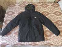 Продам зимнюю куртку the north face новую