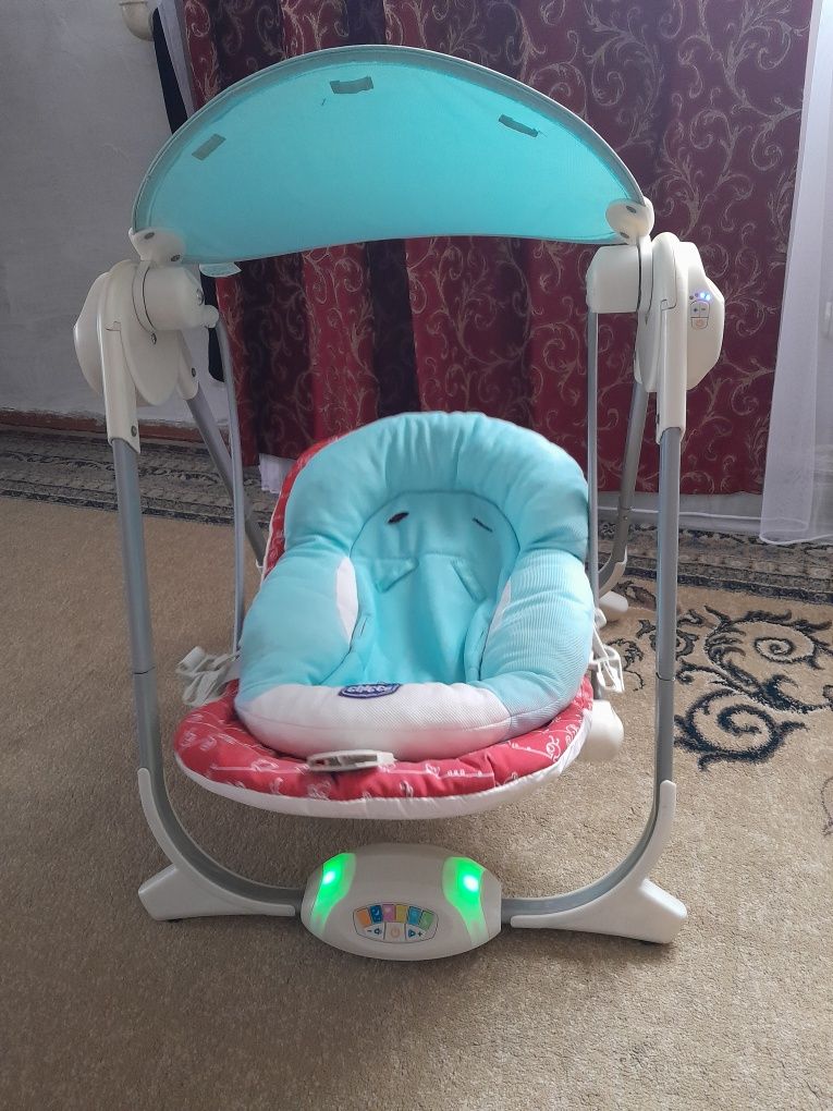 Продам качелю от Сhicco