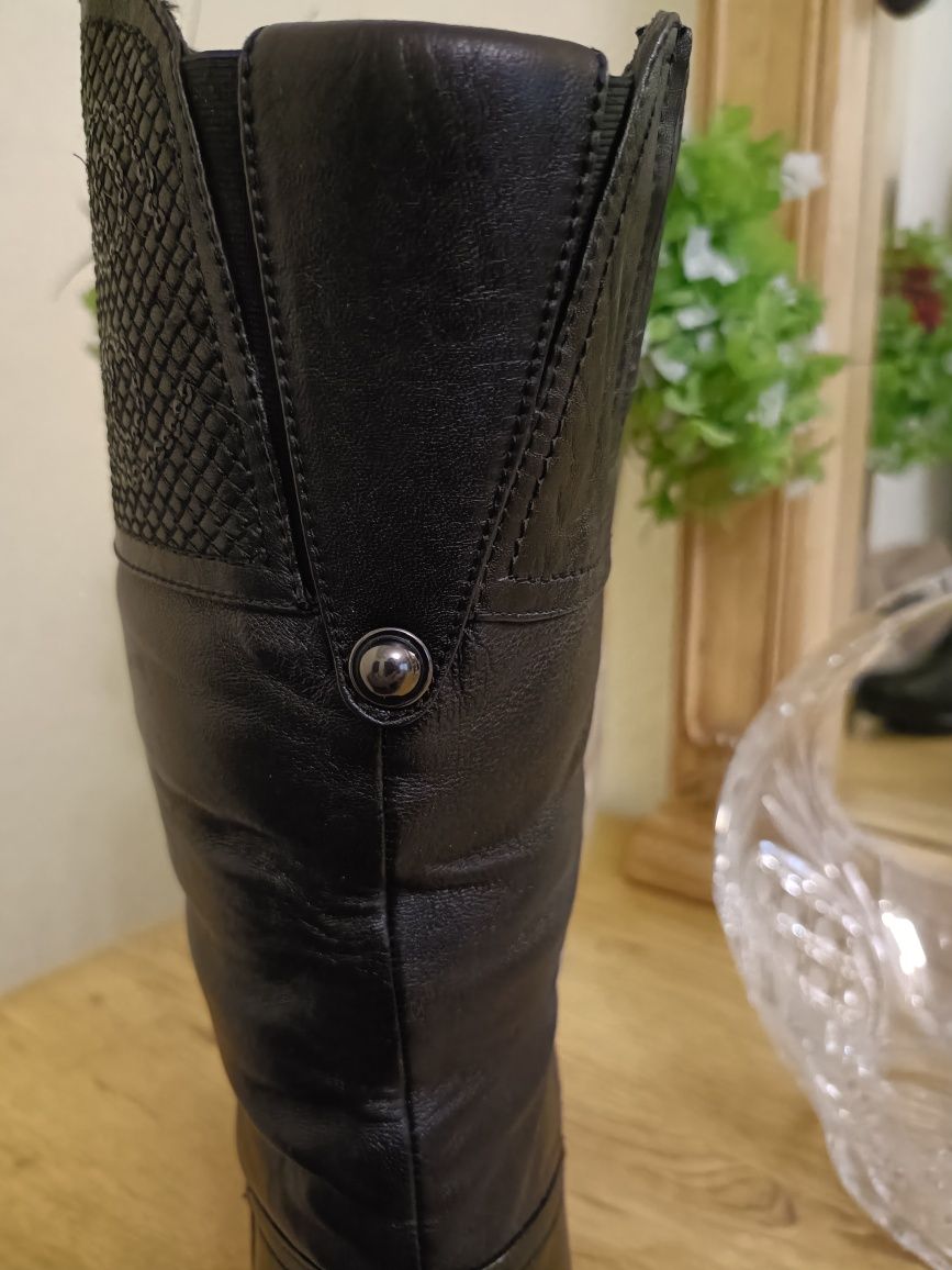 Продам сапоги новые