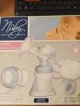 Молоко отсос  фирмы Nuby. Natural touch
