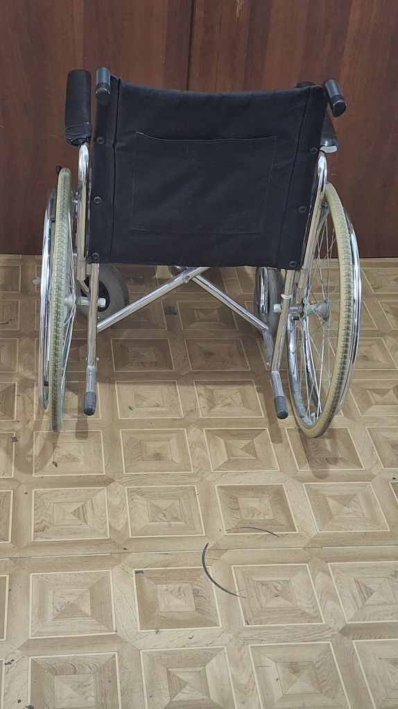 Инвалидная коляска