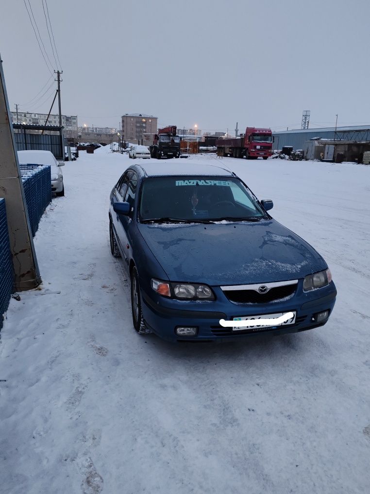 Мазда 626  птичка
