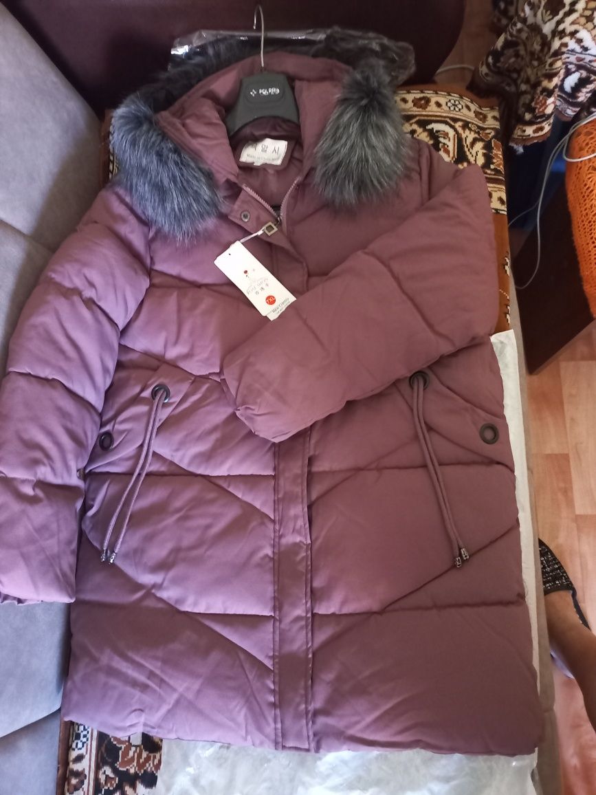Продам новый зимний женский пуховик.