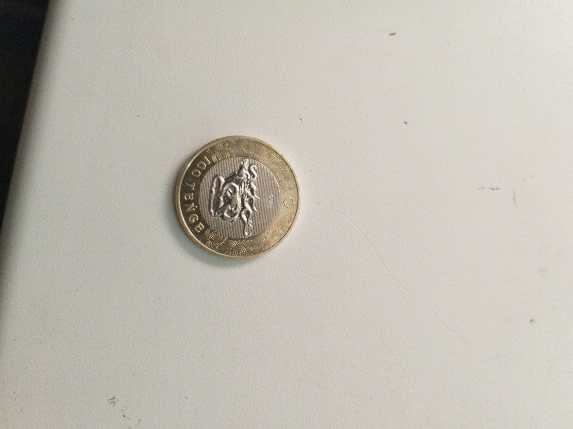 Продам монету 100тг