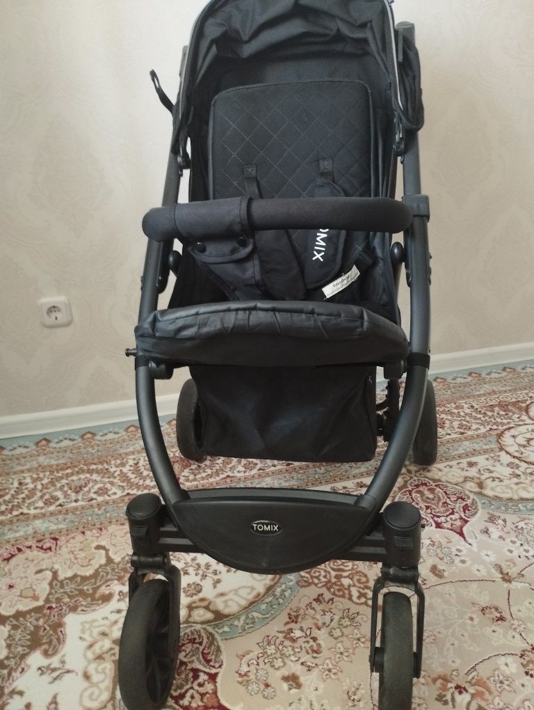 Продам коляску Tomix оригинал в отличном состоянии