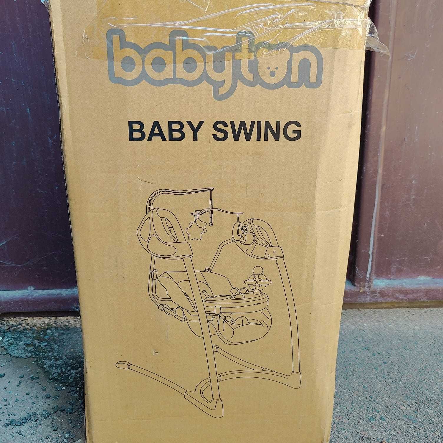Детские электронные качели BABYTON в упаковке